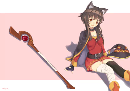Anime character Megumin from KonoSuba with cat ears (nekomimi) sitting with her hat and staff on a pink background. This high-definition desktop wallpaper and background is tagged with KonoSuba and God’s blessing on this wonderful world!!