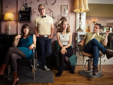 A stylish HD wallpaper featuring the band Lake Street Dive, showcasing four musicians in a vintage-inspired setting, each exuding their unique personality and charm.