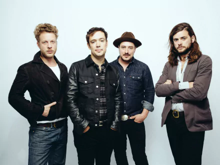HD desktop wallpaper featuring the band Mumford & Sons, posed together against a neutral backdrop.