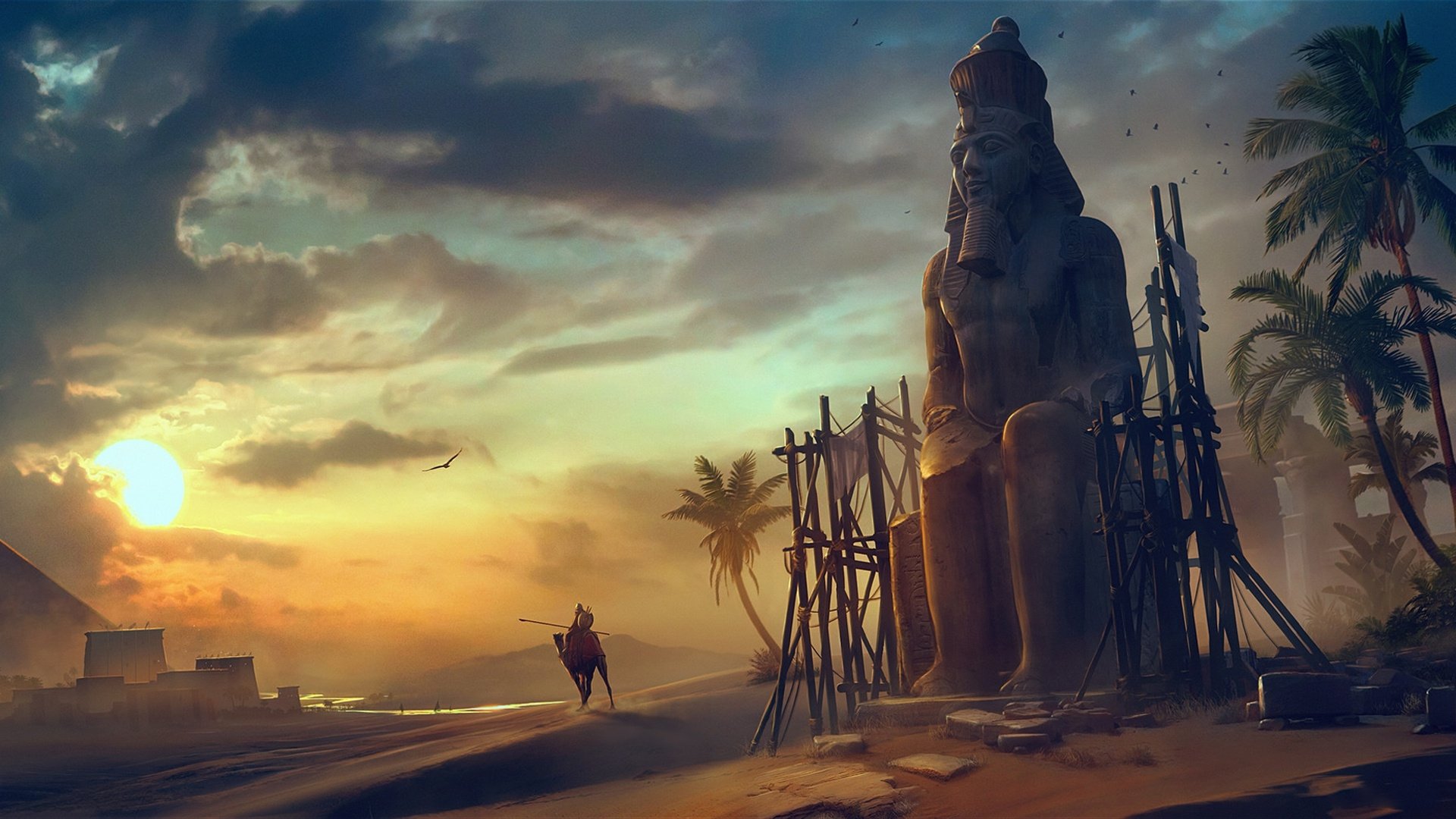 Assassin's Creed Origins video game HD PC desktop wallpaper: lone assassin walks toward a colossal Egyptian statue at sunset on a windswept beach.