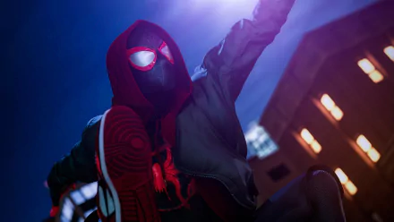 HD PC desktop wallpaper featuring Miles Morales as Spider-Man from the movie Spider-Man: Into The Spider-Verse, showcasing him in action with a dynamic urban night backdrop.