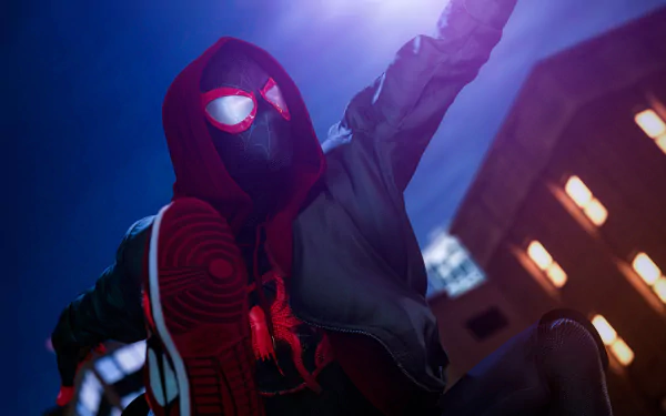 HD PC desktop wallpaper featuring Miles Morales as Spider-Man from the movie Spider-Man: Into The Spider-Verse, showcasing him in action with a dynamic urban night backdrop.