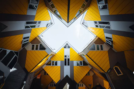 Symmetrical geometric view of yellow cube houses from below, modern man-made architecture and building design — 5K Ultra HD PC desktop wallpaper/background.