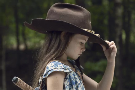 Judith Grimes (The Walking Dead): young girl in a cowboy hat clutching a bat, 4K Ultra HD PC desktop wallpaper/background.