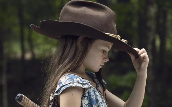 Judith Grimes (The Walking Dead): young girl in a cowboy hat clutching a bat, 4K Ultra HD PC desktop wallpaper/background.