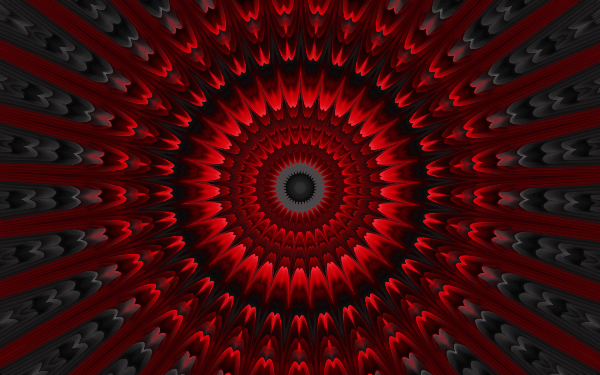 HD PC desktop wallpaper featuring an abstract red kaleidoscope pattern radiating from the center with intricate, symmetrical geometric shapes.