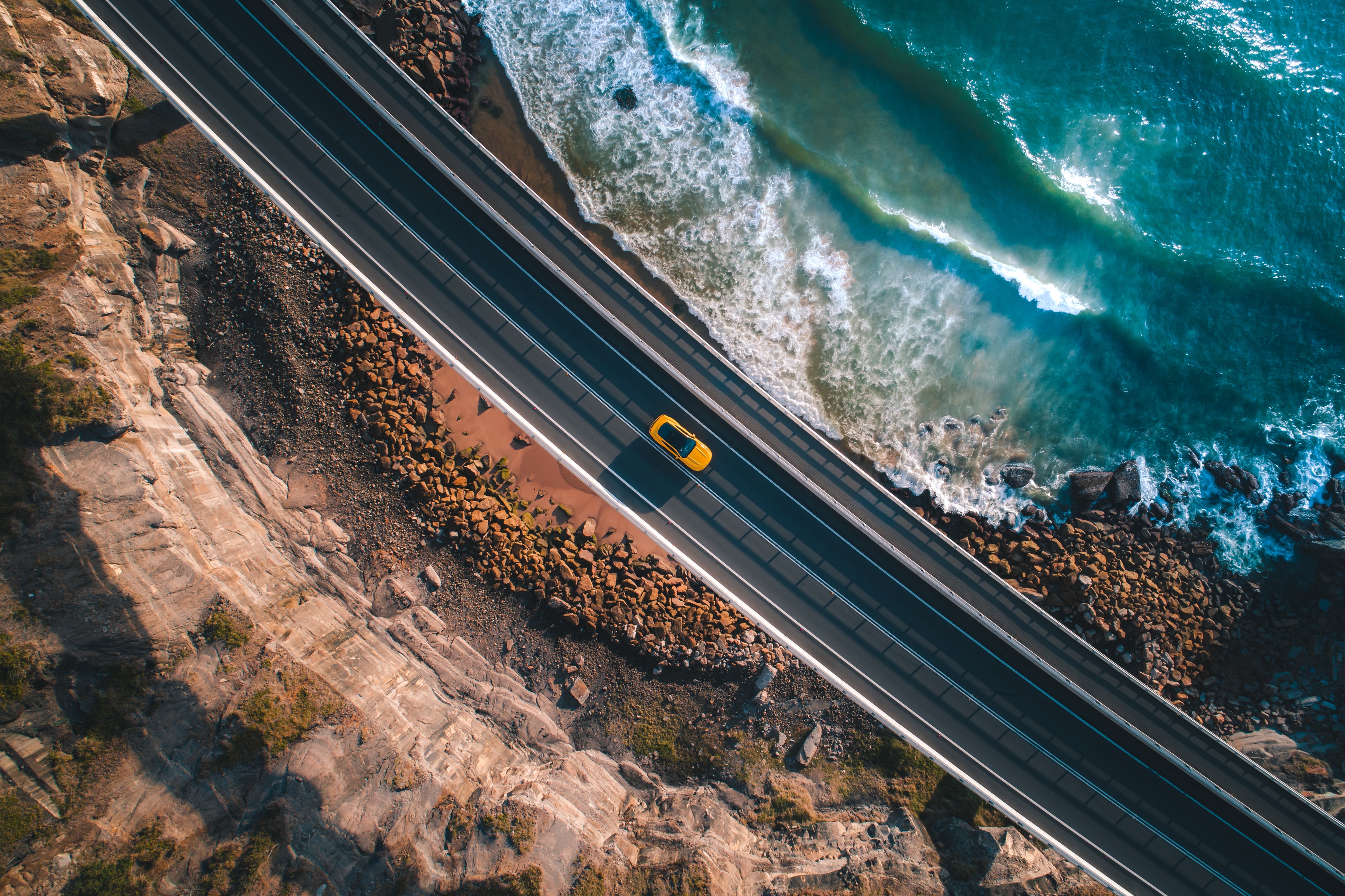 Aerial View of a Highway near the Ocean by Pat Kay
