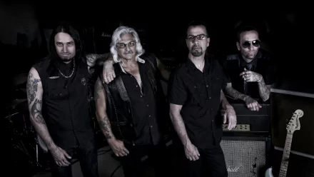 HD desktop wallpaper featuring the band Godsmack posing in black and white tones, suitable as a background.